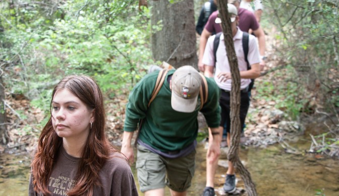 A group of Concordia students working in the preserve on campus