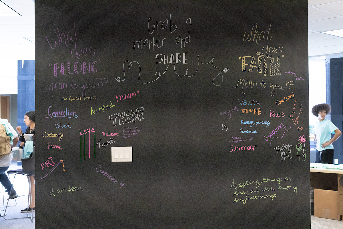 A community chalk board in the Center for Belonging and Faith