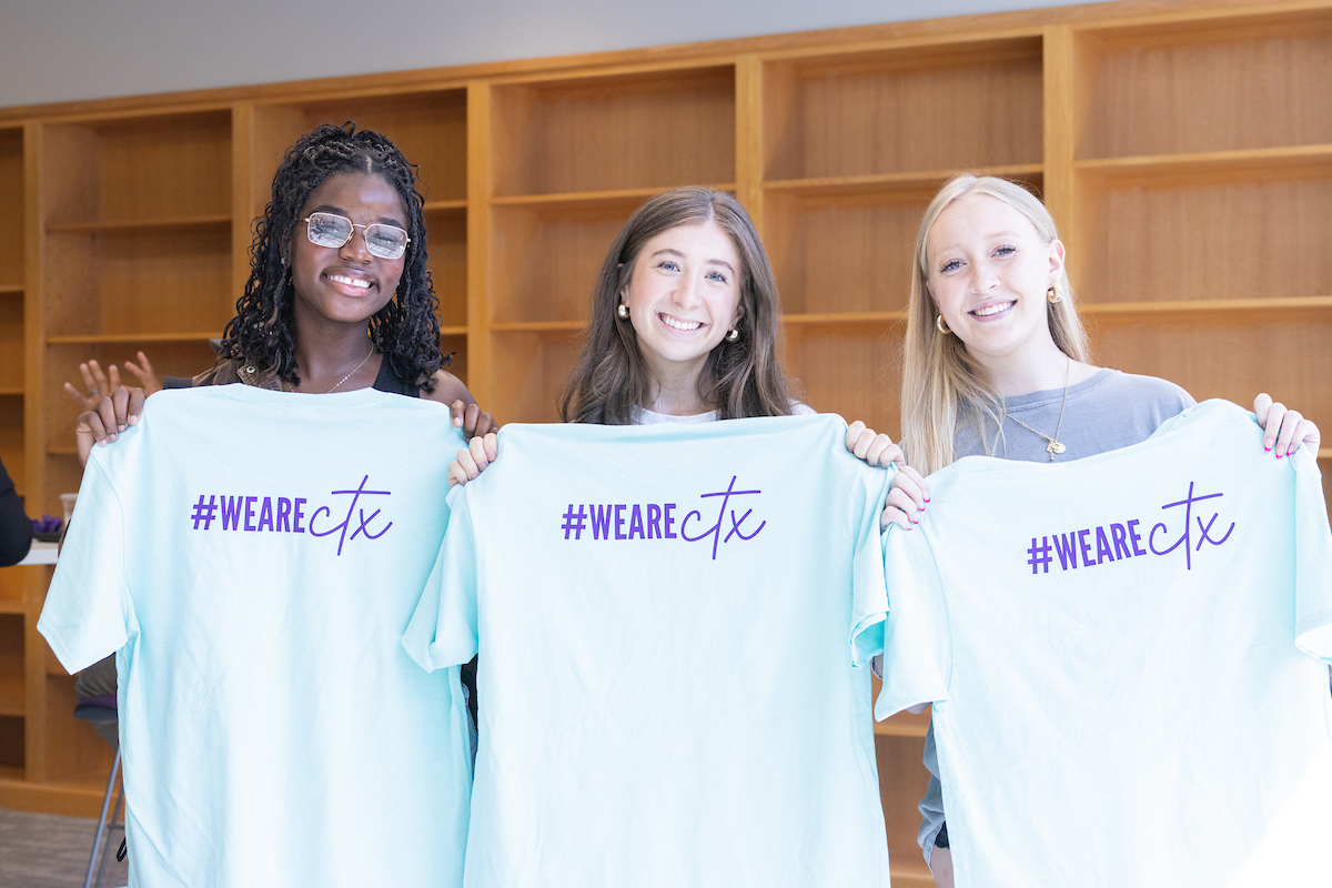 CTX students displaying we are CTX shirts