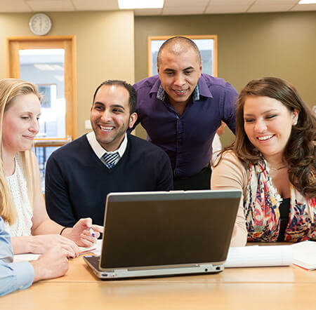 Group of MEd students working collaboratively